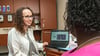 Gynecologist Amber Truehart consults with a patient